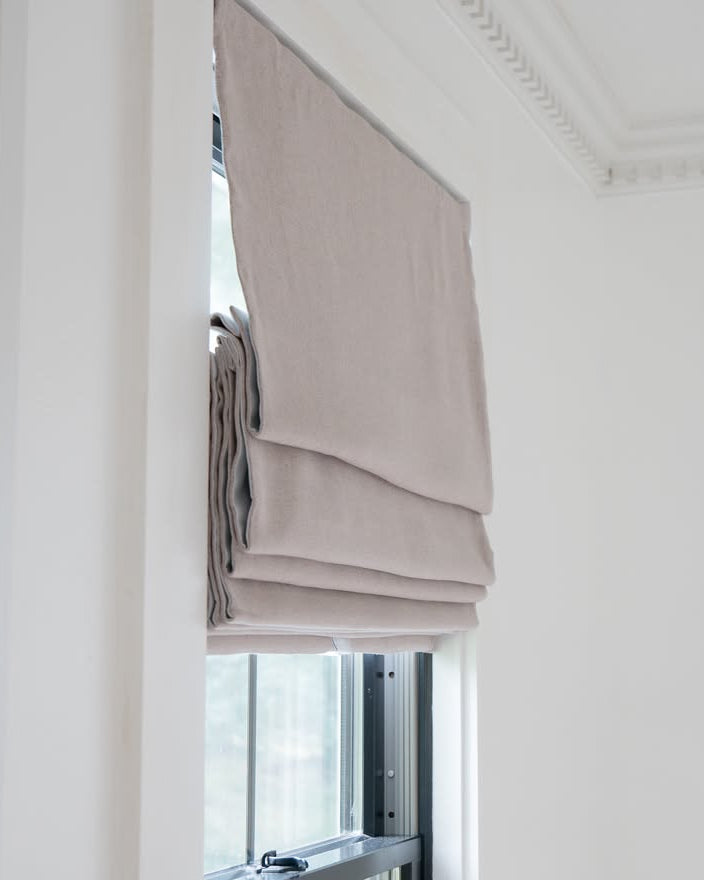 Side view of Cassandra Linen Cotton Roman Shades in Stone Beige-C5302