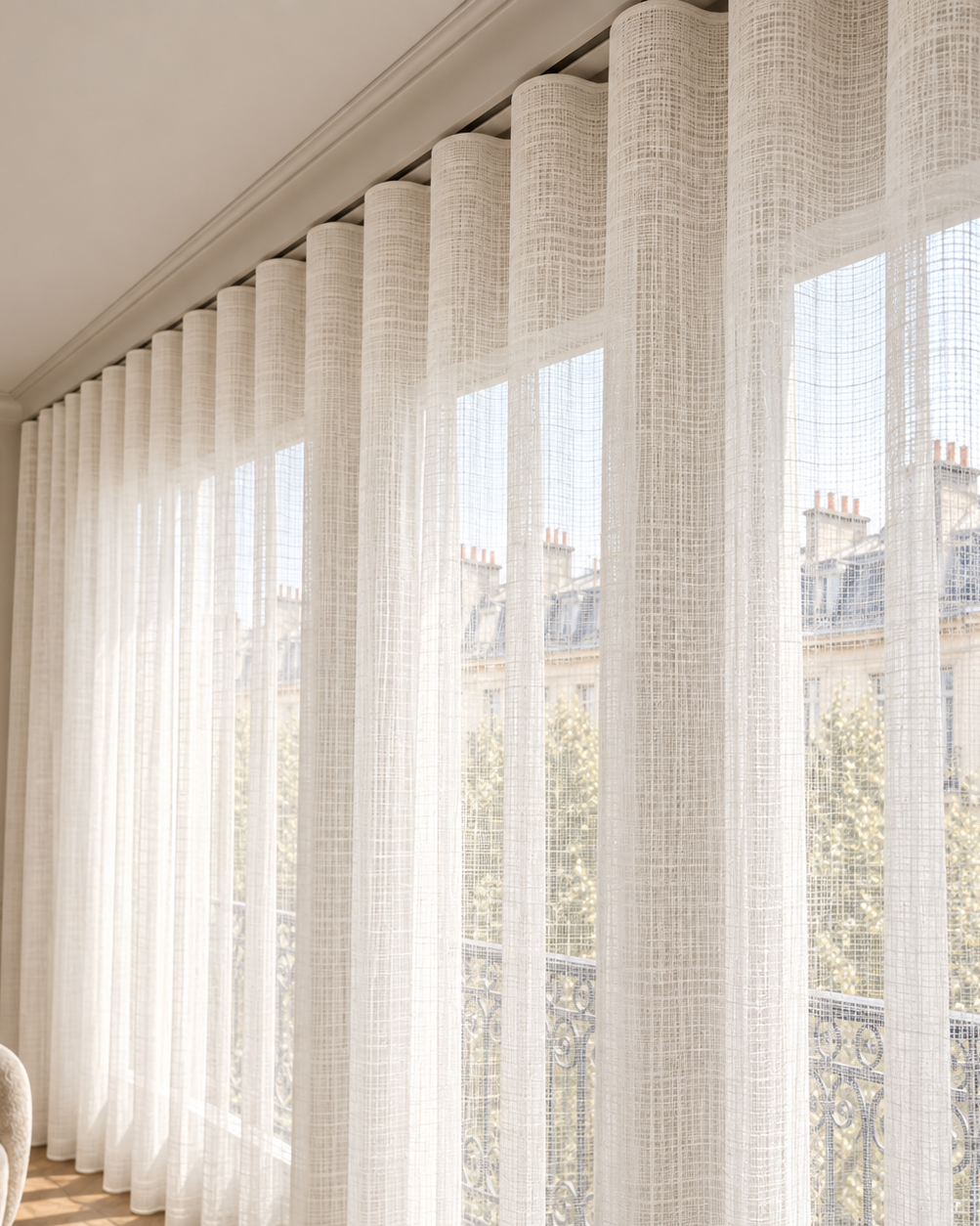 Dense ripple fold sheer curtain and ceiling track detail