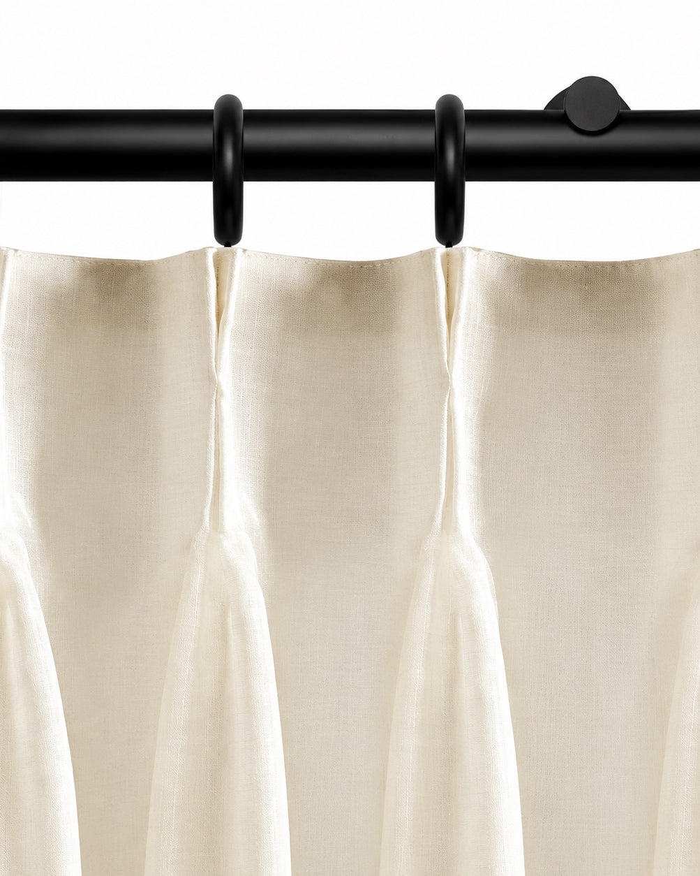 Ronan black curtain rod with rings and ivory pleated curtain