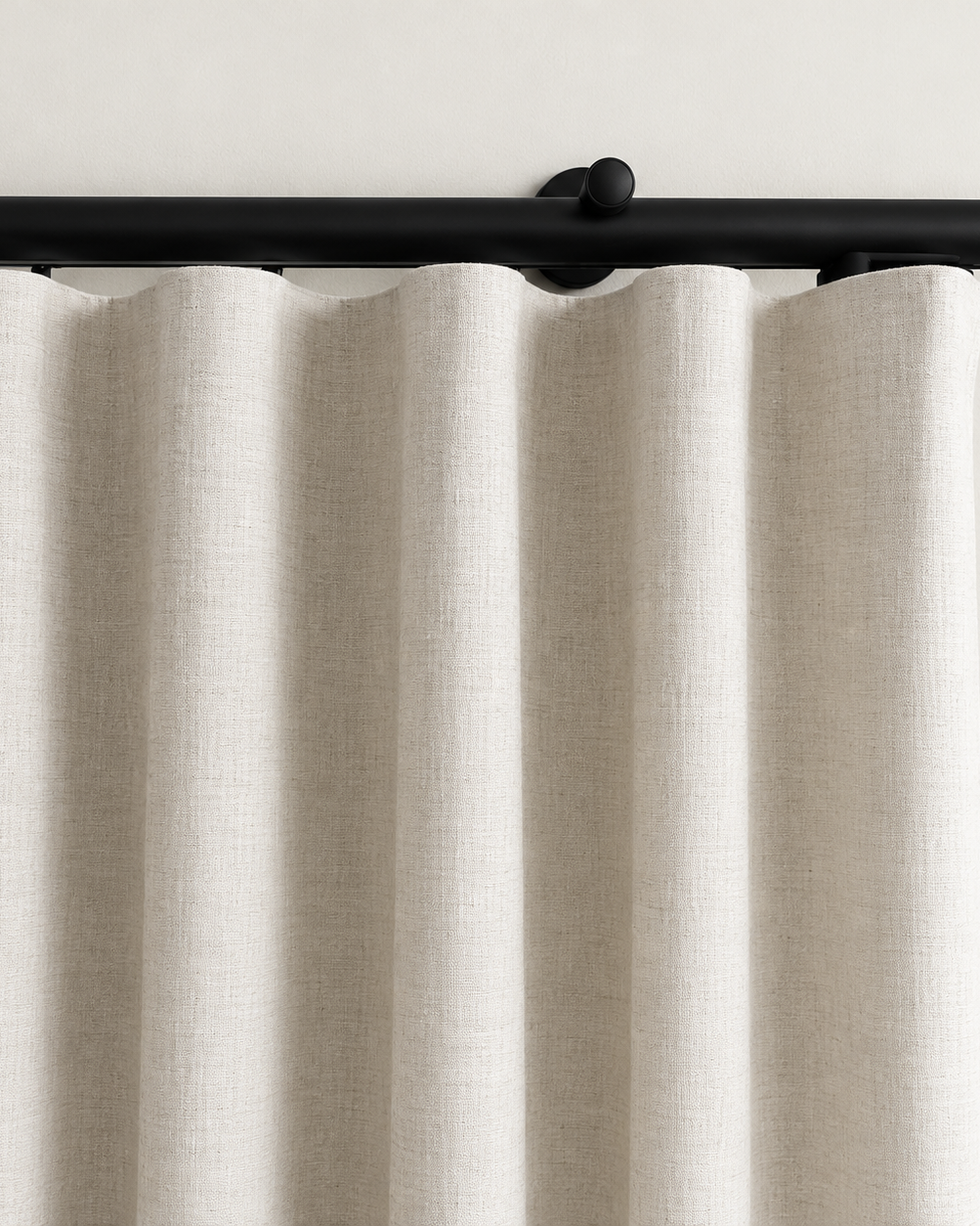 Rylan black motorized curtain rod with ivory ripple fold curtains