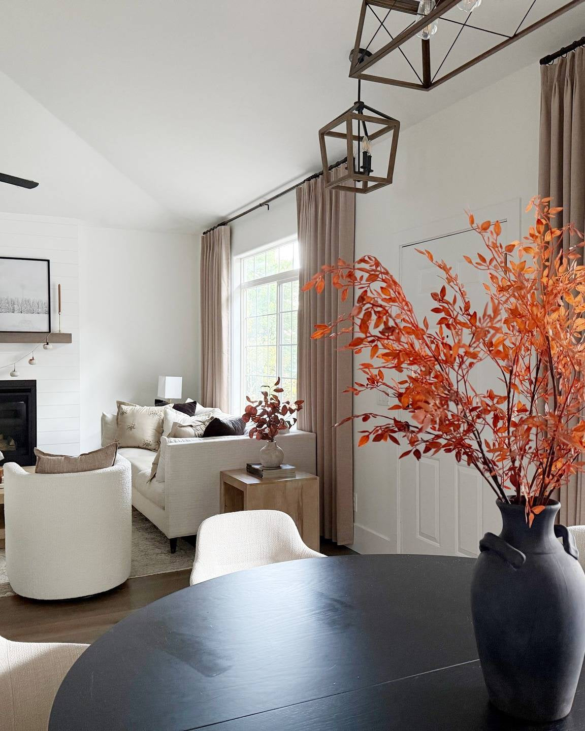 Lena Linen Soft Pebble-L2311 pleated drapery in a bright living and dining room