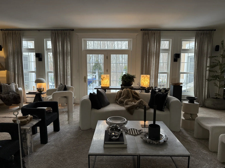 Panoramic view of Liza’s living room with curtains