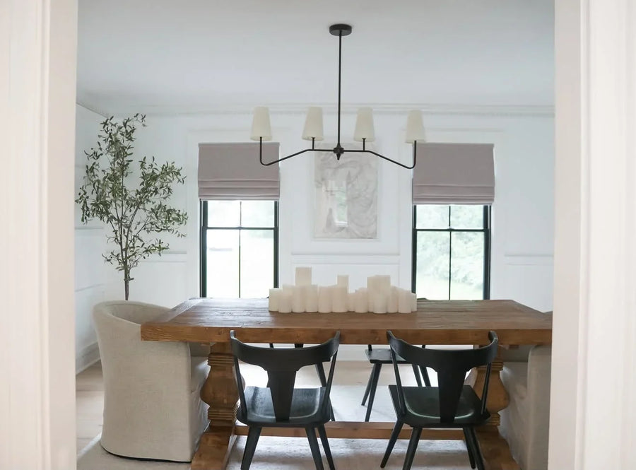 Natural woven shades filtering daylight in Yasmine Luther’s home