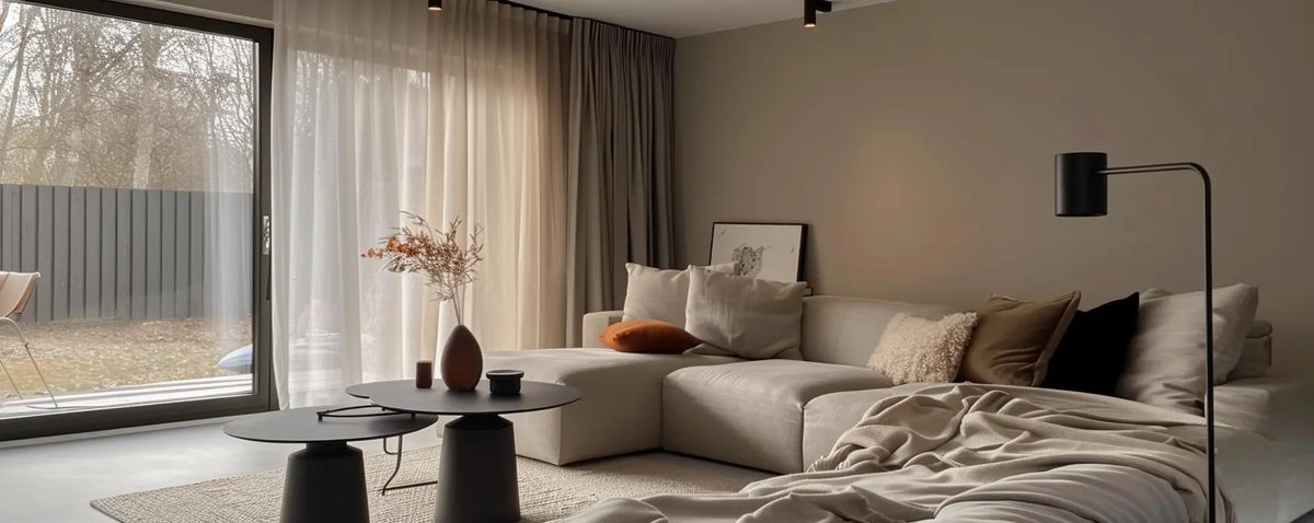 When installing curtain rods for your living room curtains, use a mix of sheer curtains and linen curtains with stylish curtain rings to achieve elegance and functionality.