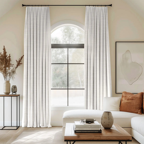 white curtains blending linen, cotton, and polyester with black curtain rods, perfect for the living room.