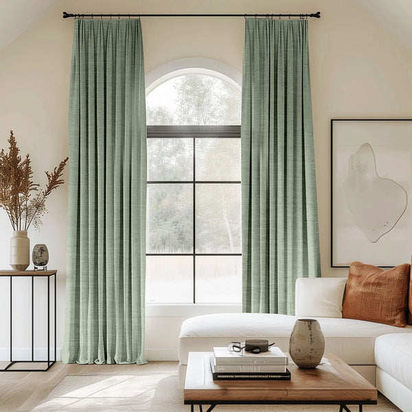 green curtains blending linen, cotton, and polyester with black curtain rods, perfect for the living room.