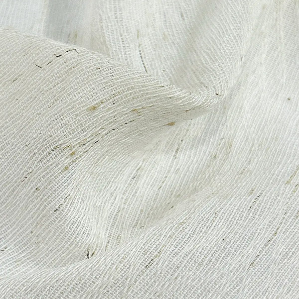 Close-up of sheer fabric sample with a textured weave, perfect for light, airy curtain designs or upholstery.