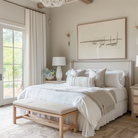 The bedroom room features white linen and polyester pleated curtains hanging on black rods.