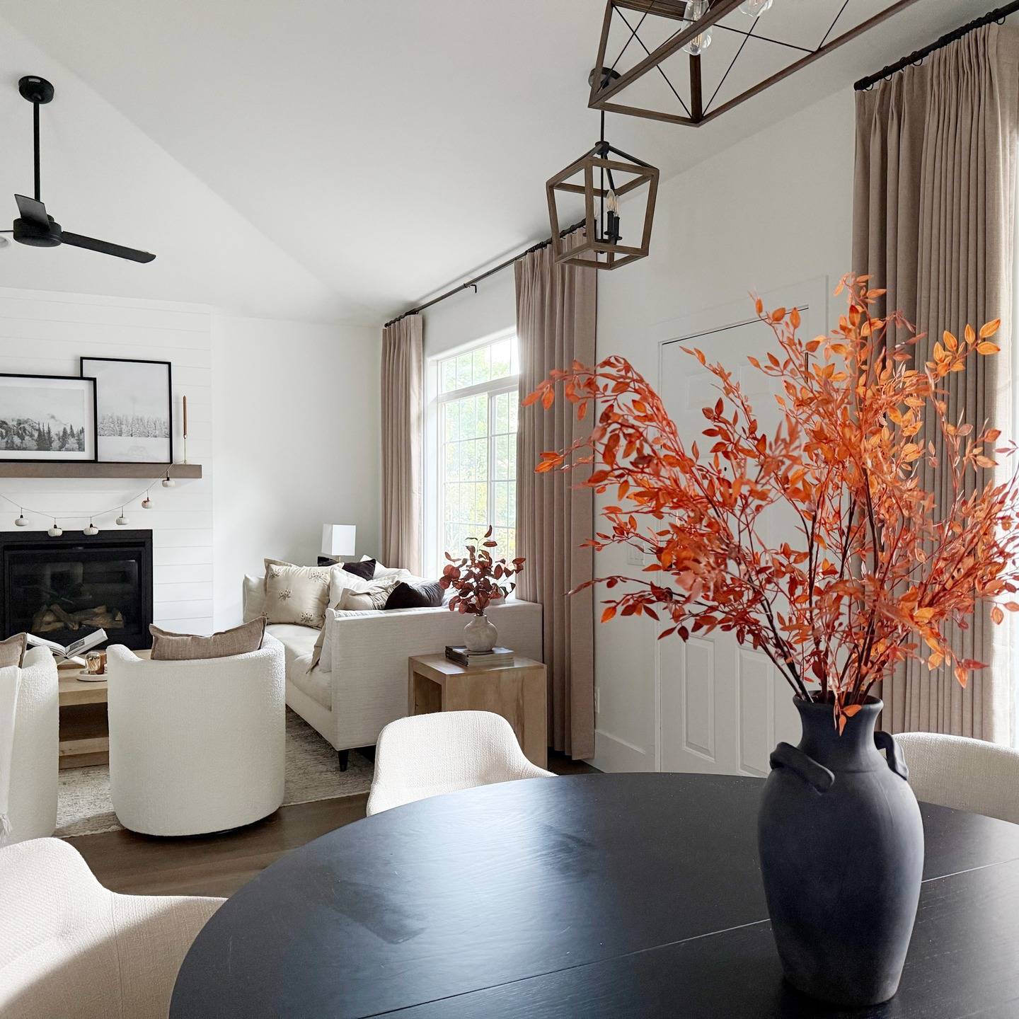 Lena Linen Soft Pebble-L2311 pleated drapery in a bright living and dining room