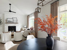 Lena Linen Soft Pebble-L2311 pleated drapery in a bright living and dining room