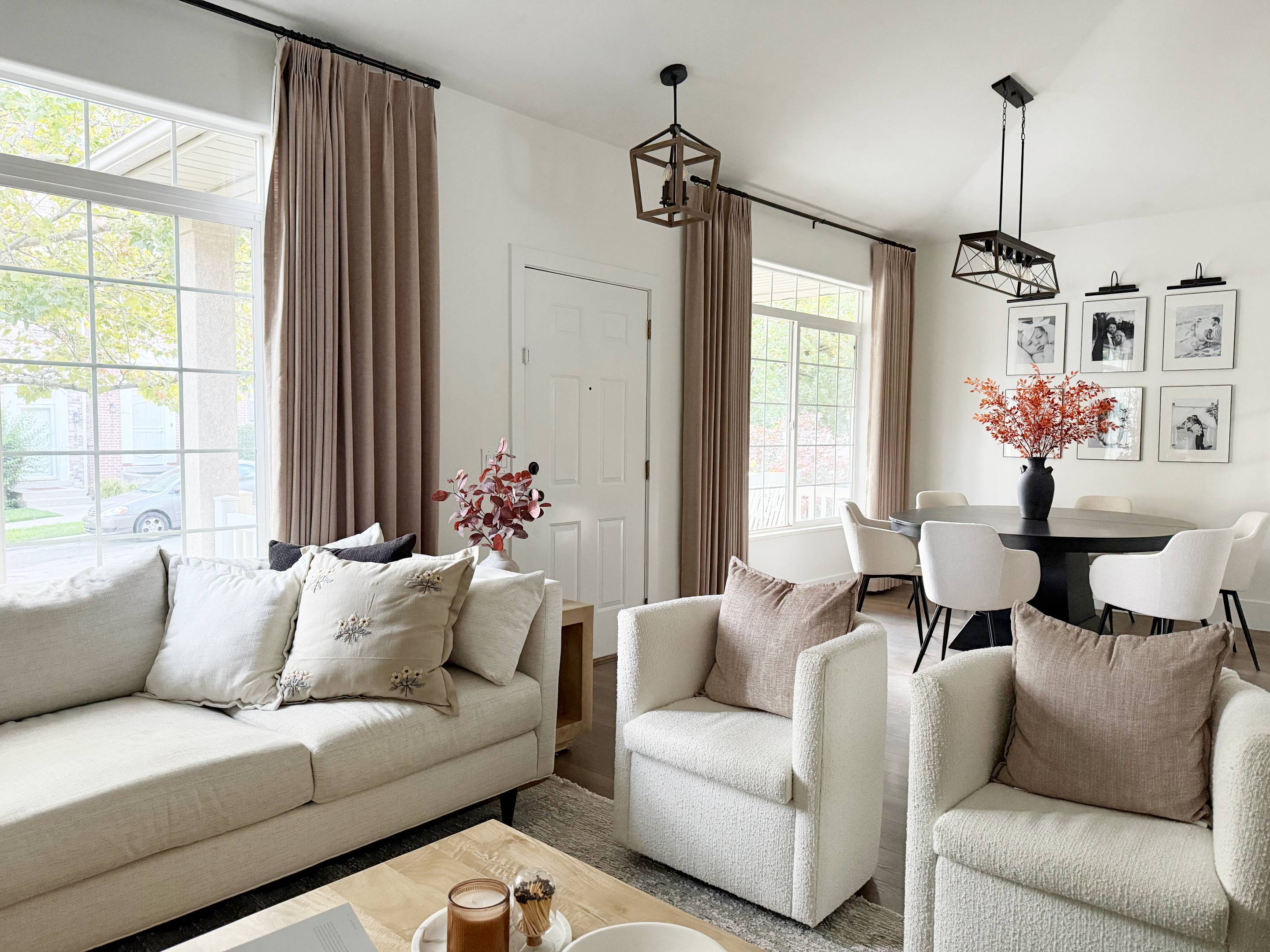 Lena Linen Soft Pebble-L2311 pleated drapery in a bright living and dining room